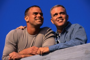 Gay Couple Leaning on a Railing