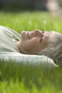 Woman Lying Down in the Grass